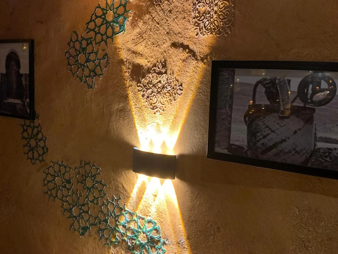 Zellige star motifs and candlelight at Dar Mansour