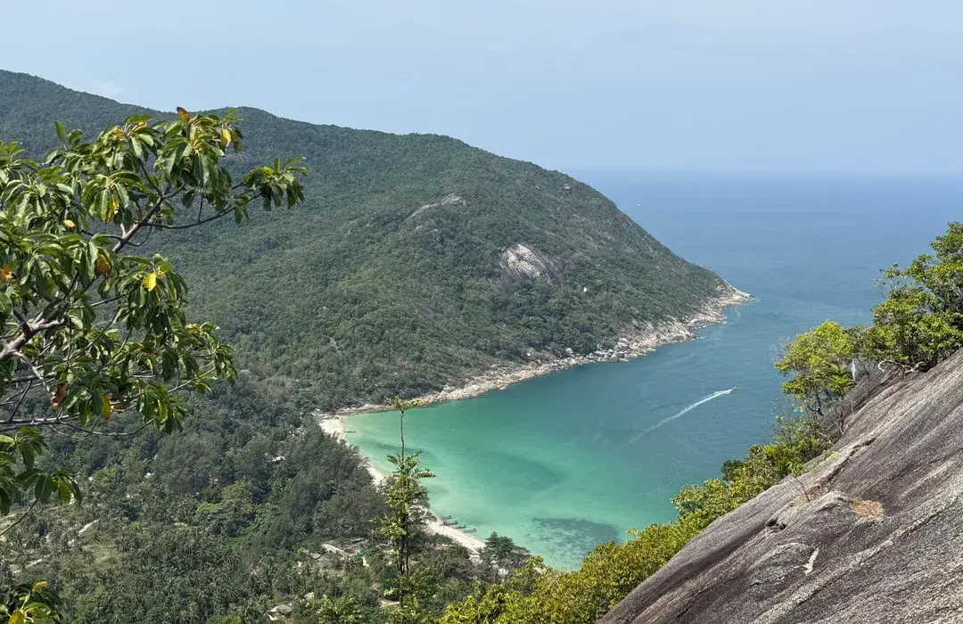 The view over Bottle Beach (Haad Khuat) and its curved bay from the viewpoint above, on Koh Phangan's north coast