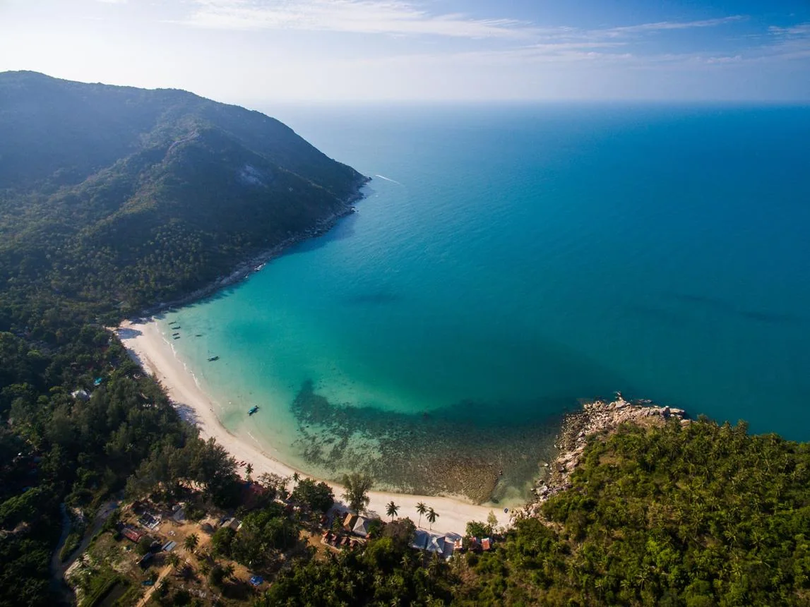 Turquoise bay and white-sand beach on the west coast of Koh Phangan