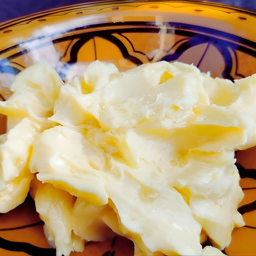 Smen, Moroccan fermented clarified butter in a painted bowl