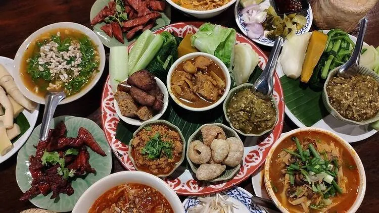 A spread of traditional Thai dishes served at a family-run kitchen on Koh Phangan