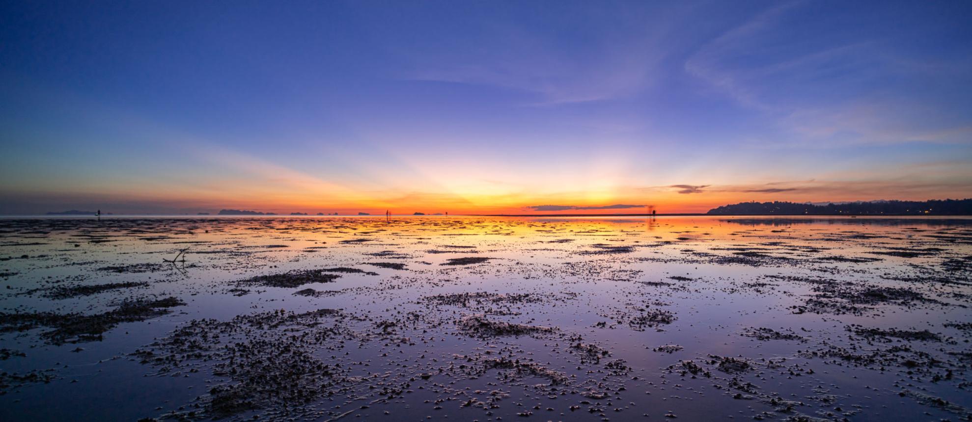 Sunset over Hin Kong Beach on Koh Phangan's west coast, Thailand